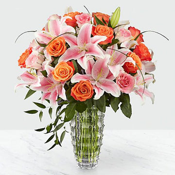 Dozen Orange Roses with Pink Lilies in a Vase